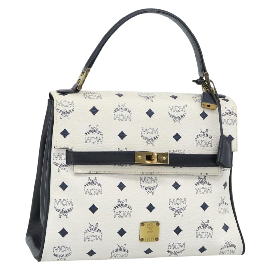 MCM Vicetos PVC Leather Handbag White Gold Tone Germany: MCM Vicetos PVC Leather Handbag White Gold Tone Germany MCM Vicetos Logogram hand bag in white and gold, made from PVC leather. It comes with a padlock, two keys, a clochette, and a mirror. Made in Ge
