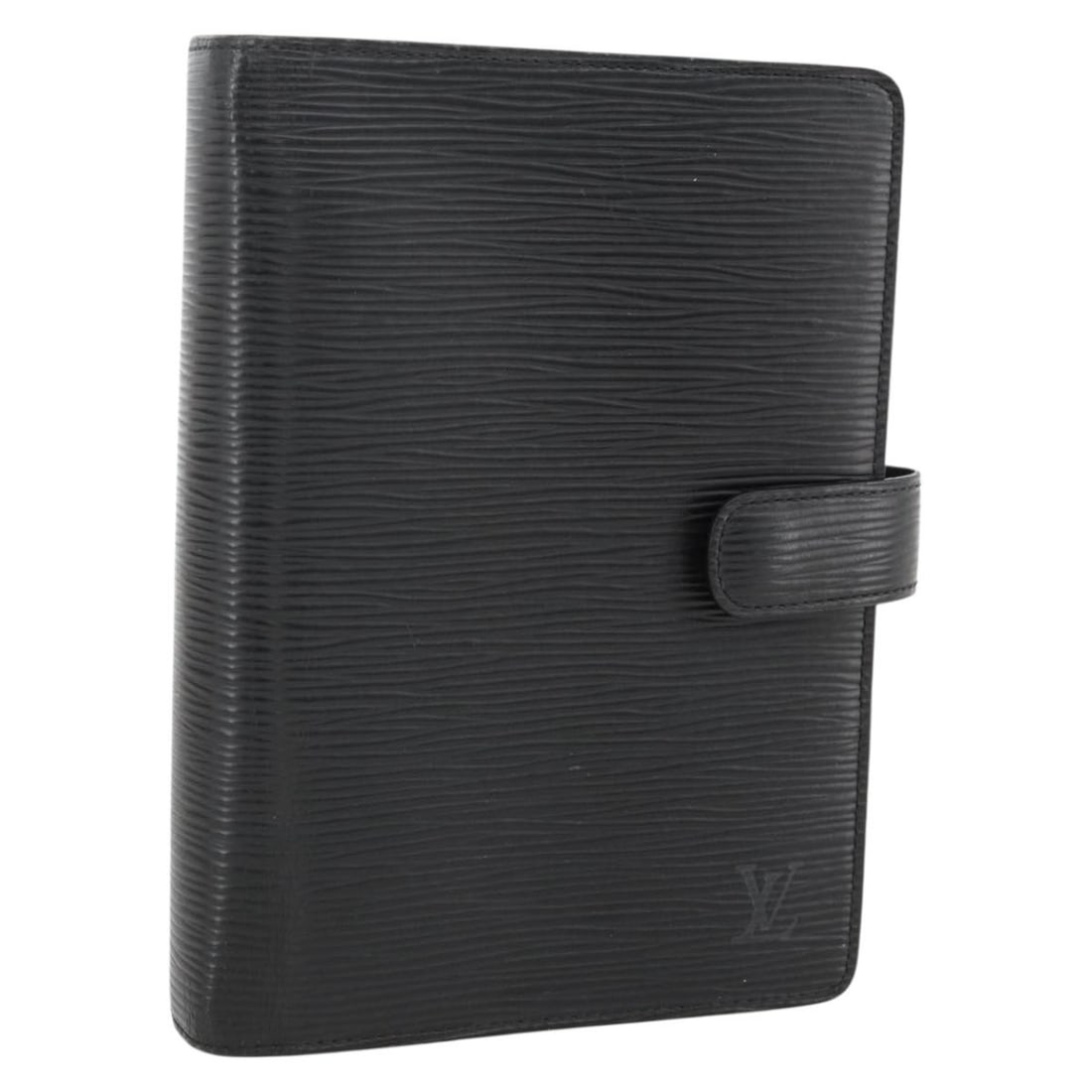 Black Epi Leather MM Day Planner Cover by Louis Vuitton R20042: Black Epi Leather MM Day Planner Cover by Louis Vuitton R20042 This is a Louis Vuitton Epi Agenda MM day planner cover in black, crafted from durable Epi leather. Designed for women, this day planner 