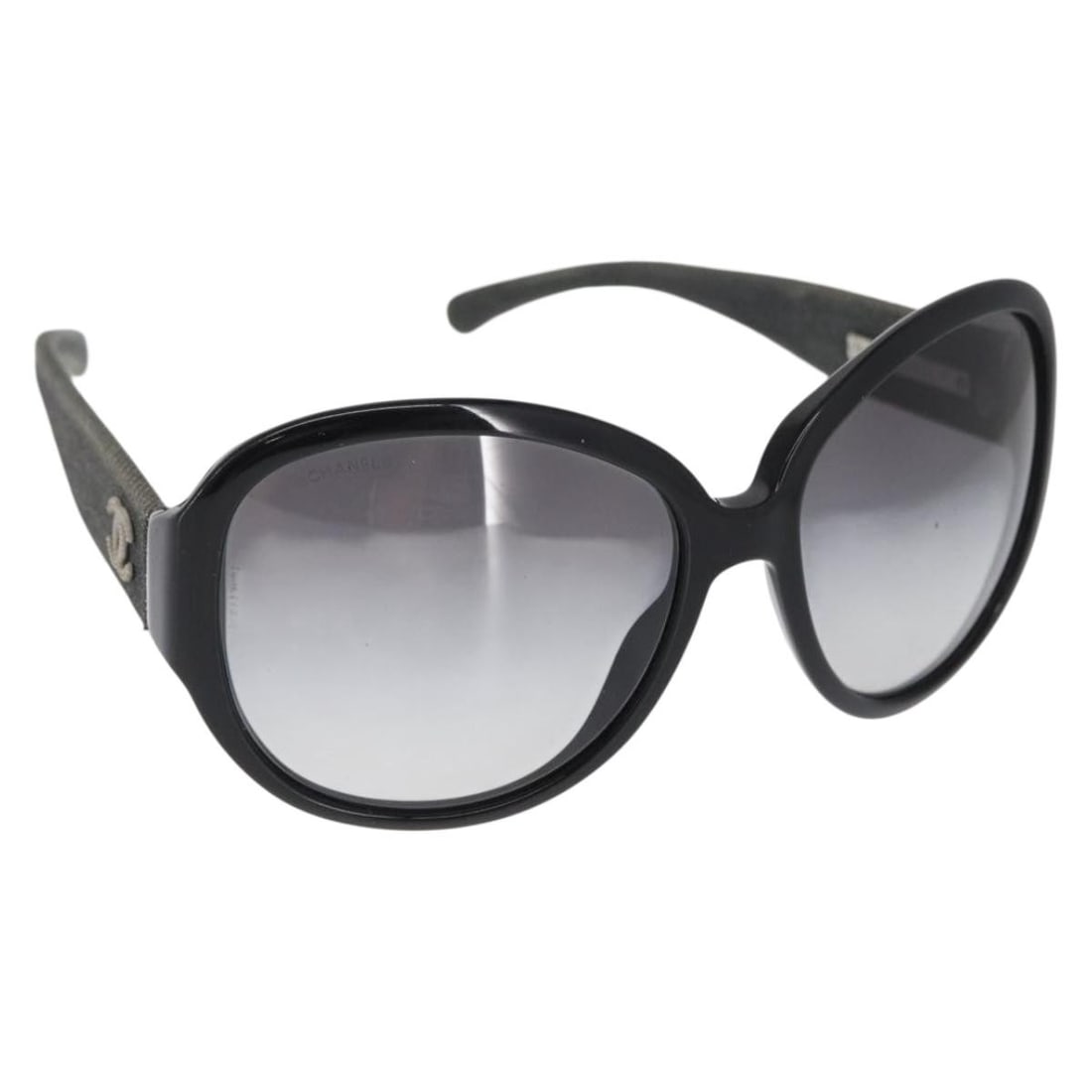 CHANEL black plastic women sunglasses Italy: CHANEL black plastic women sunglasses Italy These CHANEL sunglasses feature a classic black plastic frame, offering a timeless and versatile look. Designed for women, they are crafted in Italy and sho