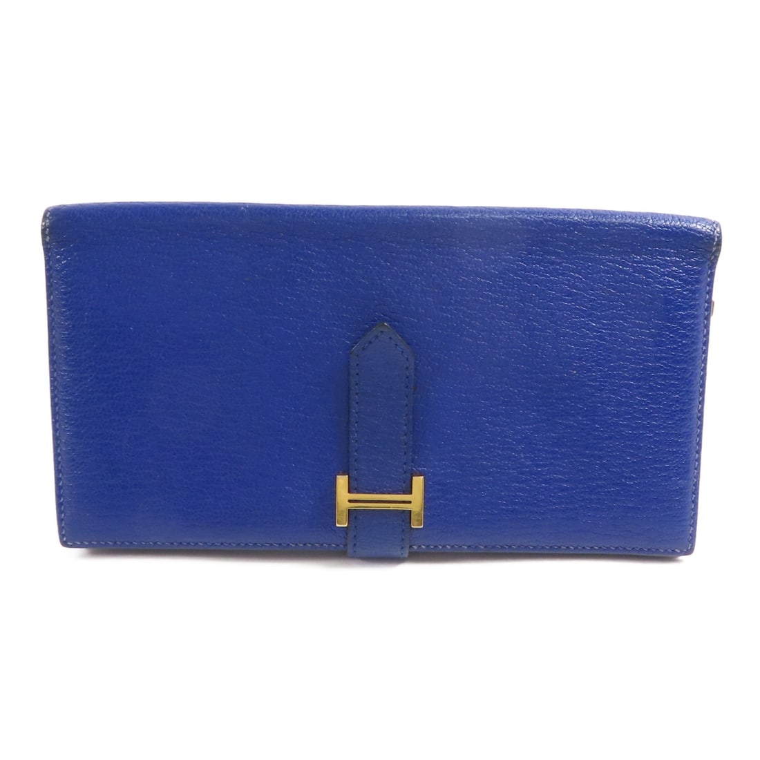 Hermes Bearn long wallet in Bleu Electrique Chevre leather: Hermes Bearn long wallet in Bleu Electrique Chevre leather Hermes Bearn long wallet in Bleu Electrique blue, made from chevre leather (goatskin). This wallet features gold-tone hardware and includes c