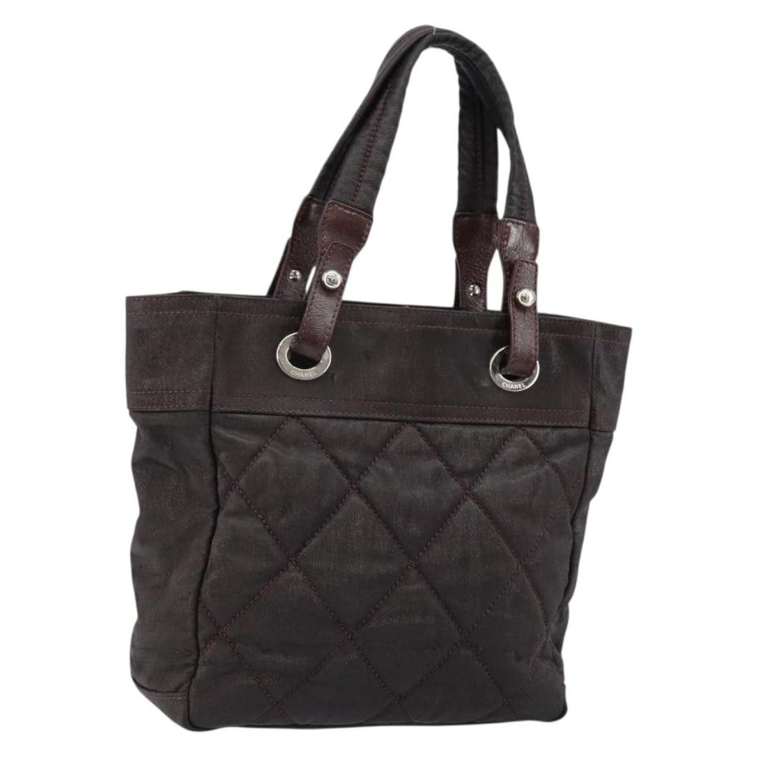 Chanel Paris Biarritz Dark Brown Coated Canvas Tote Bag Silver Hardware: Chanel Paris Biarritz Dark Brown Coated Canvas Tote Bag Silver Hardware This CHANEL Paris Biarritz tote bag features a dark brown coated canvas exterior with silver-tone accents and the iconic CC logo
