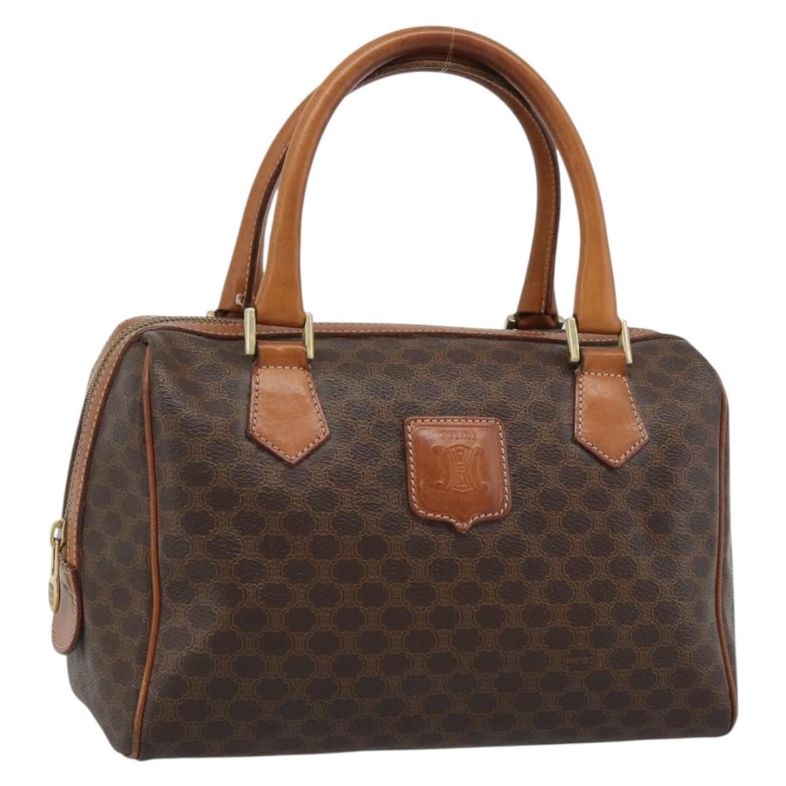 CELINE Macadam Brown Hand Bag in PVC Leather Canvas: CELINE Macadam Brown Hand Bag in PVC Leather Canvas A CELINE handbag in brown and gold, crafted from PVC leather and Macadam canvas. Made in Italy, this pre-owned bag features a handle drop of approxi