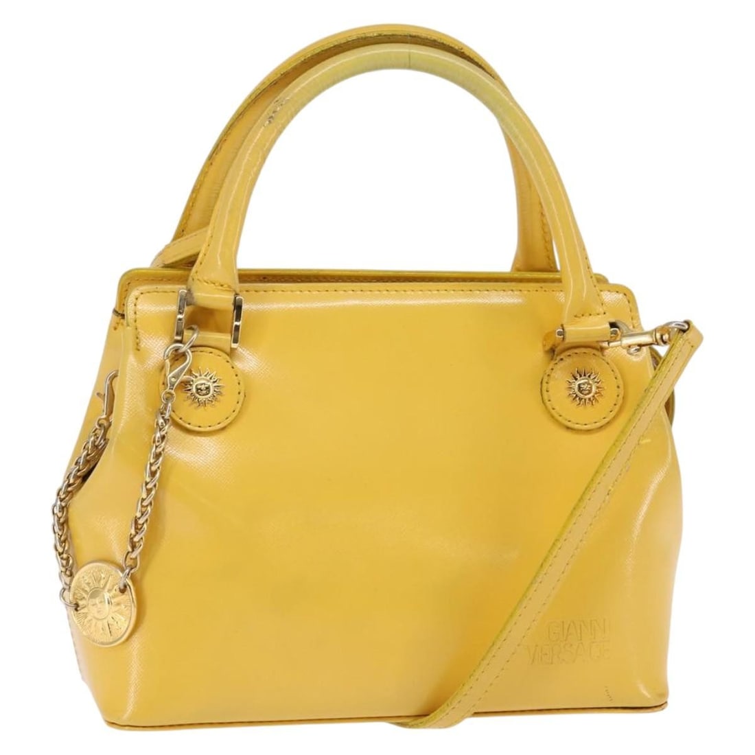 Gianni Versace Leather Hand Bag Yellow Gold Authentic 2-Way Italy: Gianni Versace Leather Hand Bag Yellow Gold Authentic 2-Way Italy This Gianni Versace handbag is a stunning accessory crafted from high-quality leather in a vibrant yellow and gold color combination. 