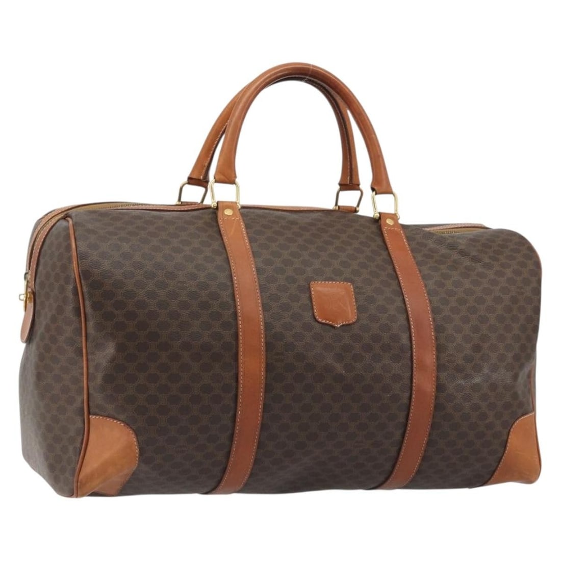 CELINE Macadam Boston Bag Brown PVC Leather Gold Tone: CELINE Macadam Boston Bag Brown PVC Leather Gold Tone CELINE Boston bag in brown and gold PVC leather and Macadam canvas, made in Italy. The bag features a structured Boston bag style with a handle dr