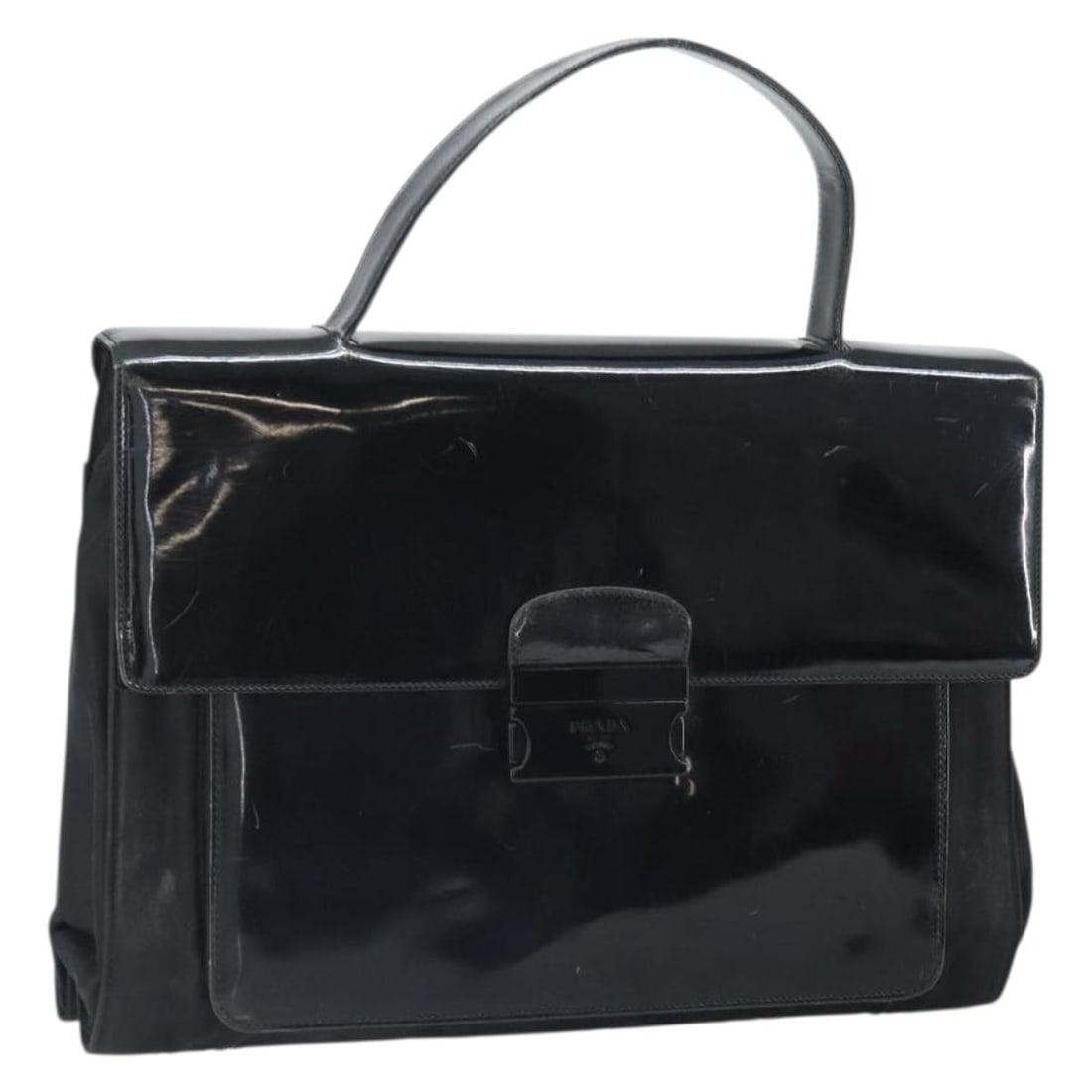 Black Patent Leather Handbag by PRADA Italy: Black Patent Leather Handbag by PRADA Italy This PRADA handbag features a black patent leather exterior with a sleek, structured silhouette. Crafted in Italy, it offers a spacious interior and a comfo