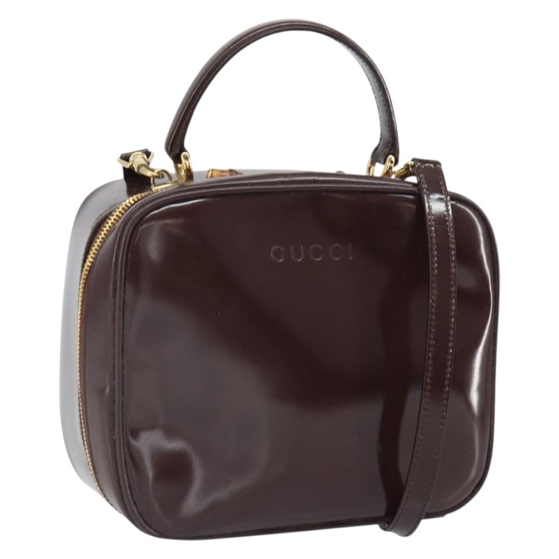 Brown Gold Patent Leather 2way Bag with Strap and Dust Bag by Gucci: Brown Gold Patent Leather 2way Bag with Strap and Dust Bag by Gucci This GUCCI handbag is crafted from brown and gold patent leather, offering a versatile 2-way design with both a top handle and a det