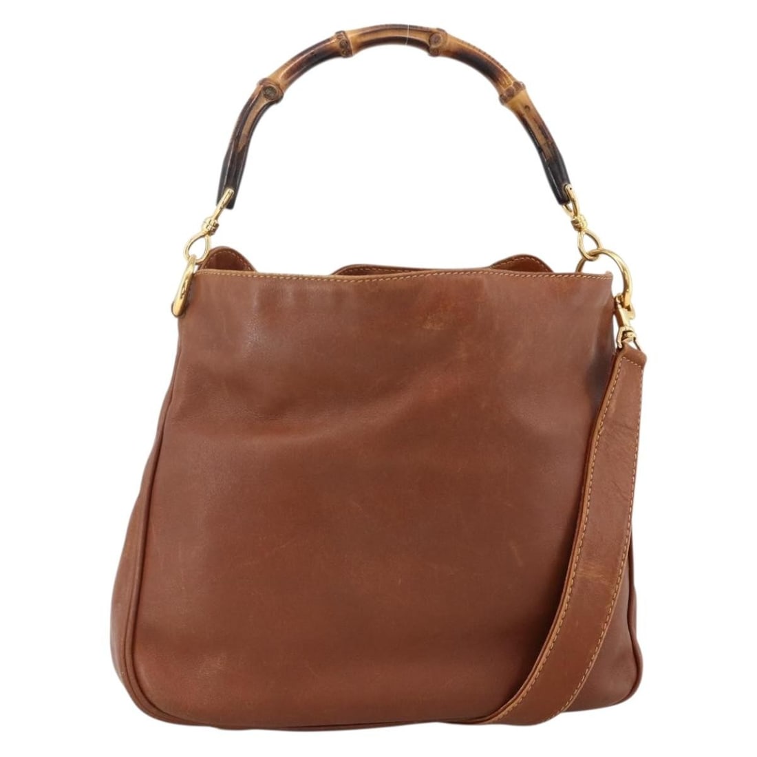 Gucci Bamboo leather shoulder bag brown gold Italy 2way: Gucci Bamboo leather shoulder bag brown gold Italy 2way This GUCCI Bamboo Hand Bag is crafted from brown and gold leather and offers versatile carrying options with both handles and a detachable shoul