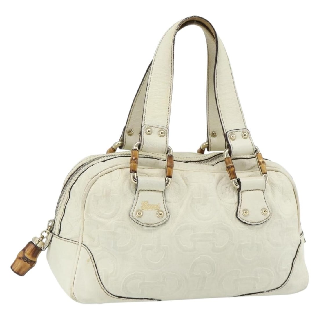 Gucci Bamboo Leather Boston Bag White Gold 154376: Gucci Bamboo Leather Boston Bag White Gold 154376 This GUCCI Bamboo Boston Bag is crafted from white and gold leather, featuring a structured silhouette with bamboo-style handles. The bag is designed 