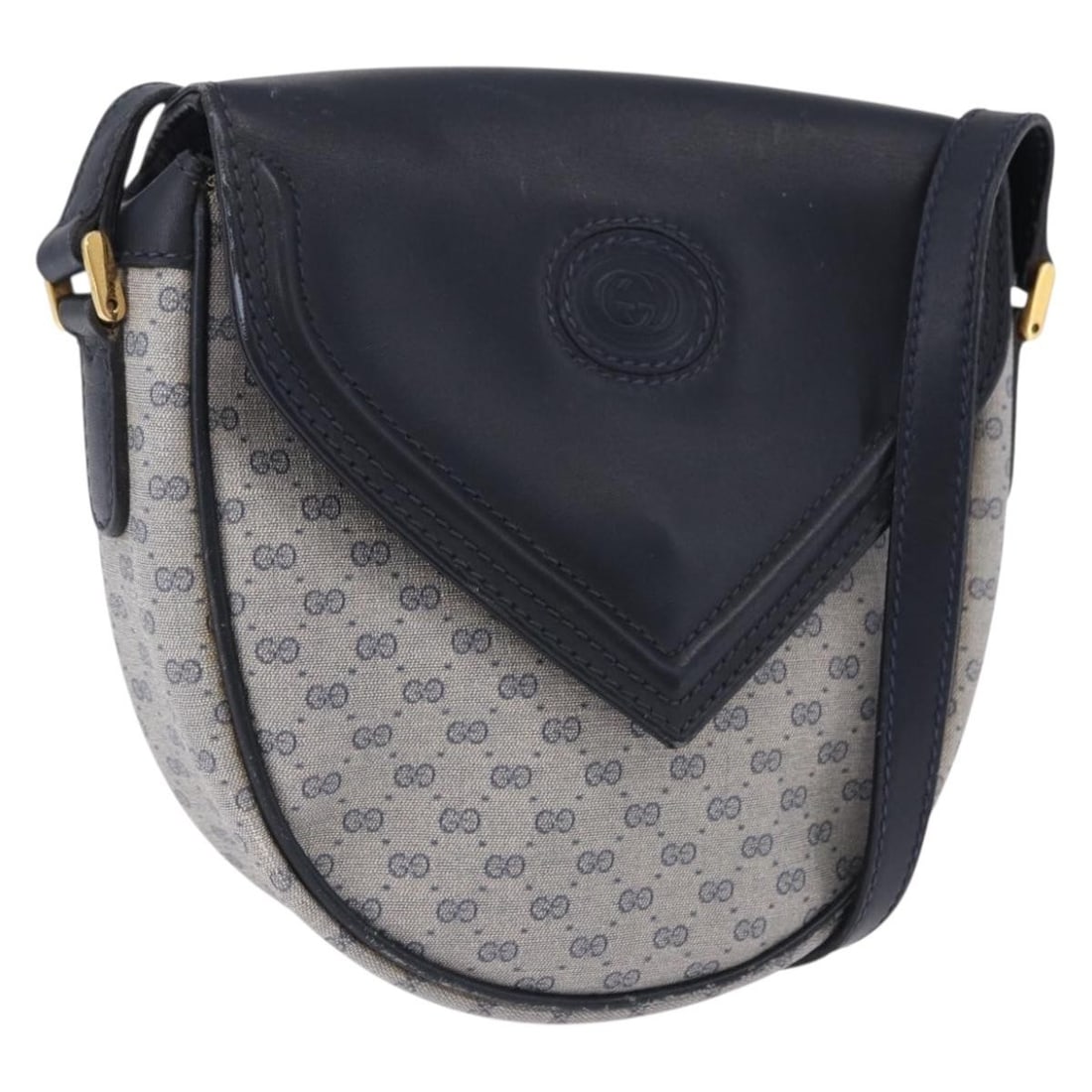 Gucci 007 261 0081 Micro GG Supreme PVC Leather Navy Shoulder Bag: Gucci 007 261 0081 Micro GG Supreme PVC Leather Navy Shoulder Bag Gucci Micro GG Supreme shoulder bag in navy and gold, made in Italy from PVC leather and Micro Small GG canvas. This pre-owned shoulde