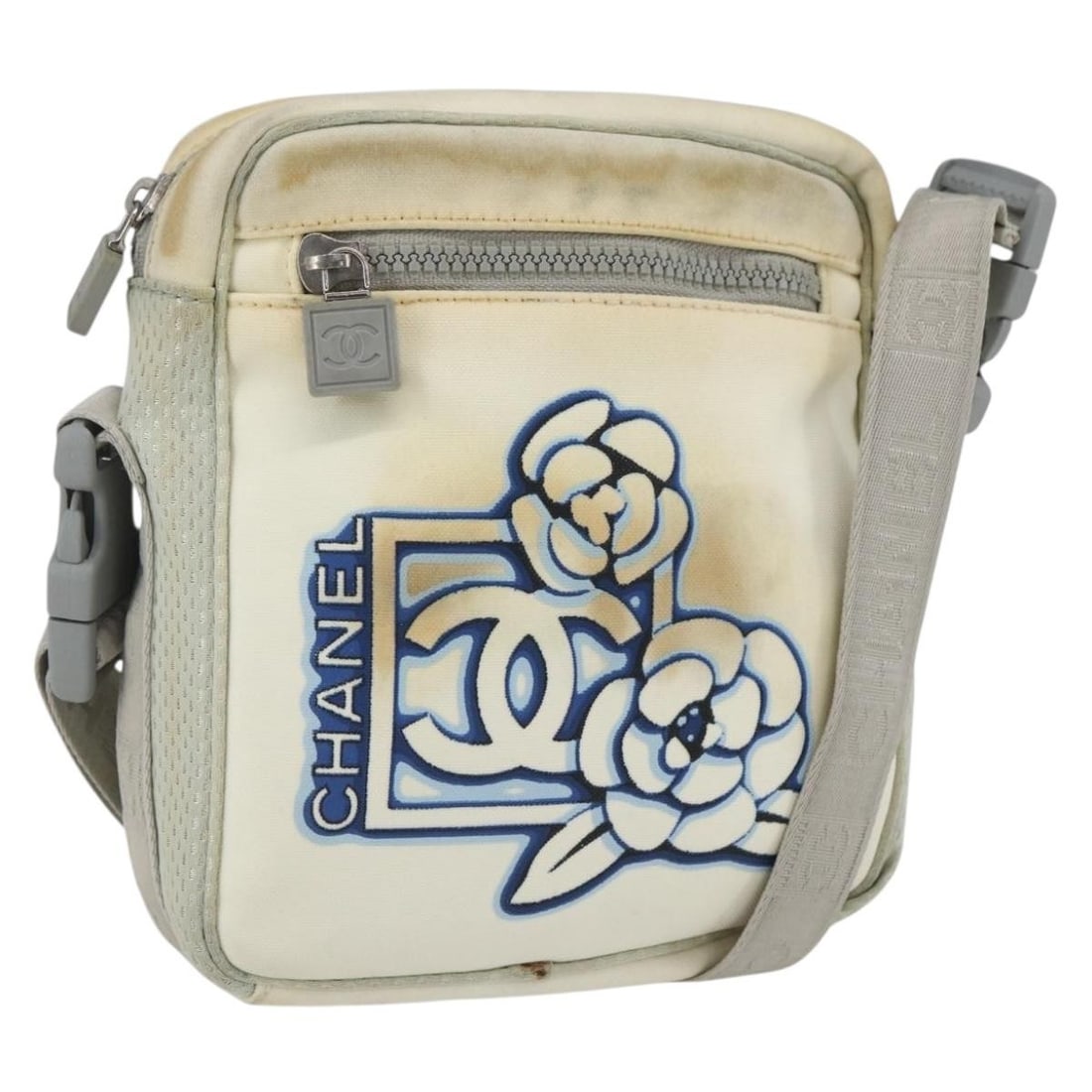 CHANEL Sports Line Canvas Shoulder Bag White Silver CC: CHANEL Sports Line Canvas Shoulder Bag White Silver CC Chanel Sports Line shoulder bag in white and silver canvas. Made in Italy, this bag measures approximately W18 cm x H19 cm x D4 cm, with a should