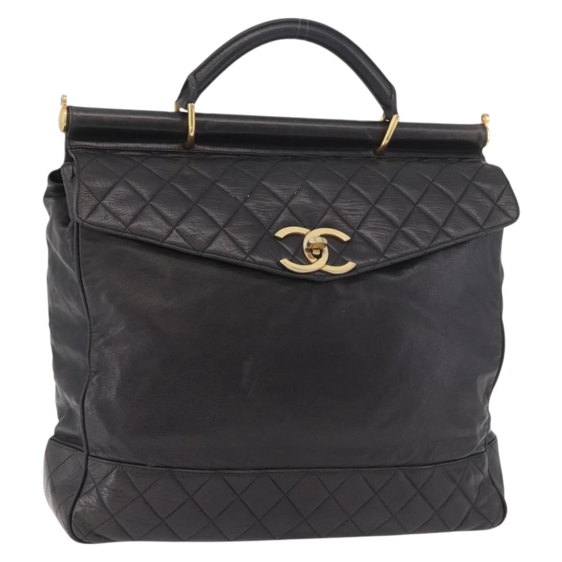 CHANEL CC Lamb Skin Hand Bag Black Gold Italy: CHANEL CC Lamb Skin Hand Bag Black Gold Italy CHANEL Matelasse hand bag in black and gold lamb skin, made in Italy. The bag has a handle drop of approximately 3.1 inches (8 cm) and measures approximat