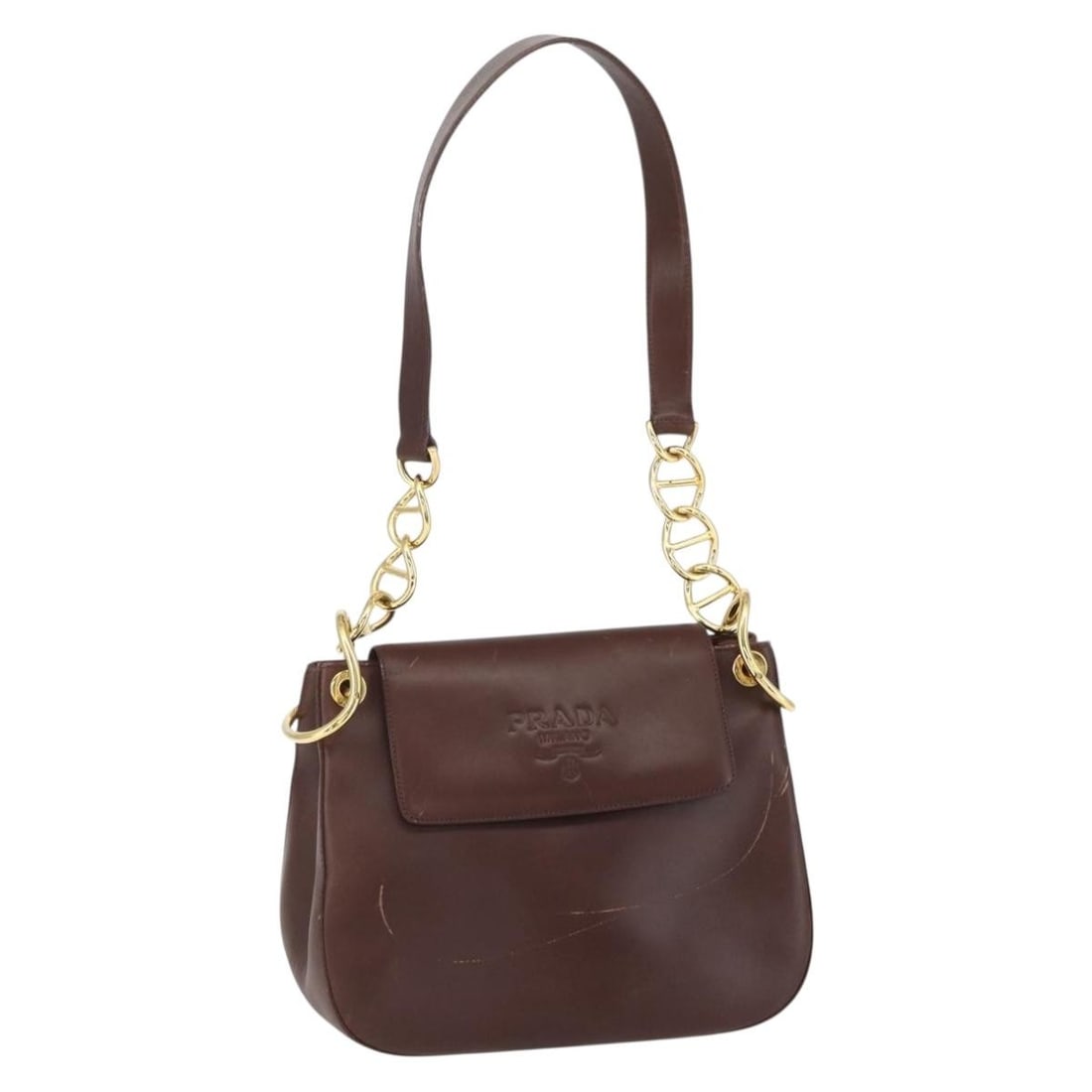 PRADA Brown Leather Shoulder Bag Gold Tone Italy: PRADA Brown Leather Shoulder Bag Gold Tone Italy This PRADA shoulder bag is crafted from brown and gold leather and made in Italy. It features a structured silhouette with a spacious interior, a shoul
