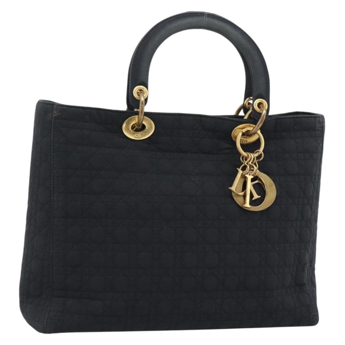 Christian Dior Cannage Canvas Hand Bag Black Gold Tone: Christian Dior Cannage Canvas Hand Bag Black Gold Tone Christian Dior hand bag in black canvas with gold tone exterior details. Made in Italy, this women's bag measures approximately 12.2 x 9.8 x 3.5 