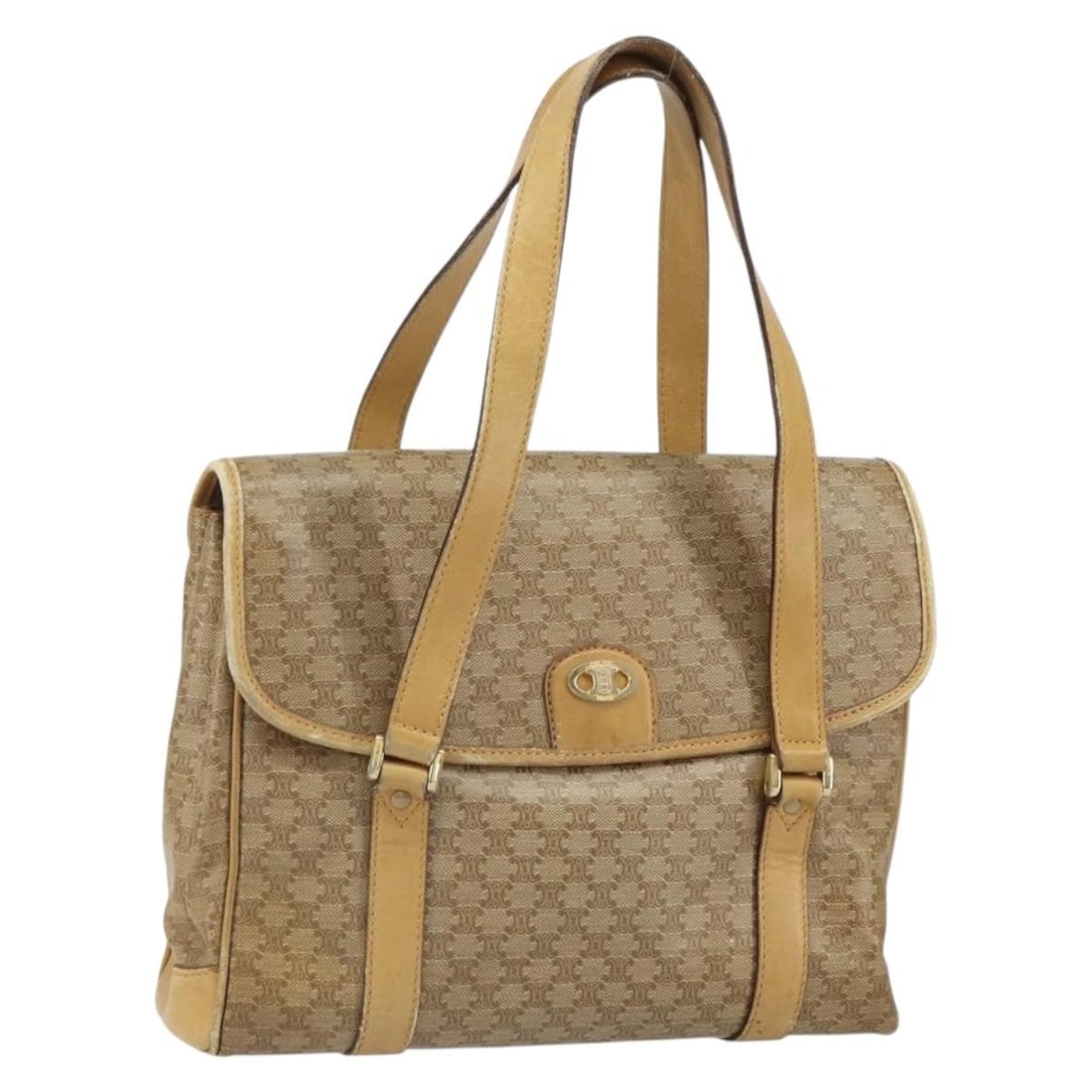 Beige Macadam Canvas PVC CELINE Handbag with Gold Accents: Beige Macadam Canvas PVC CELINE Handbag with Gold Accents This CELINE Macadam Canvas hand bag features beige and gold PVC leather with the signature Macadam canvas pattern. Made in Italy, the bag offe