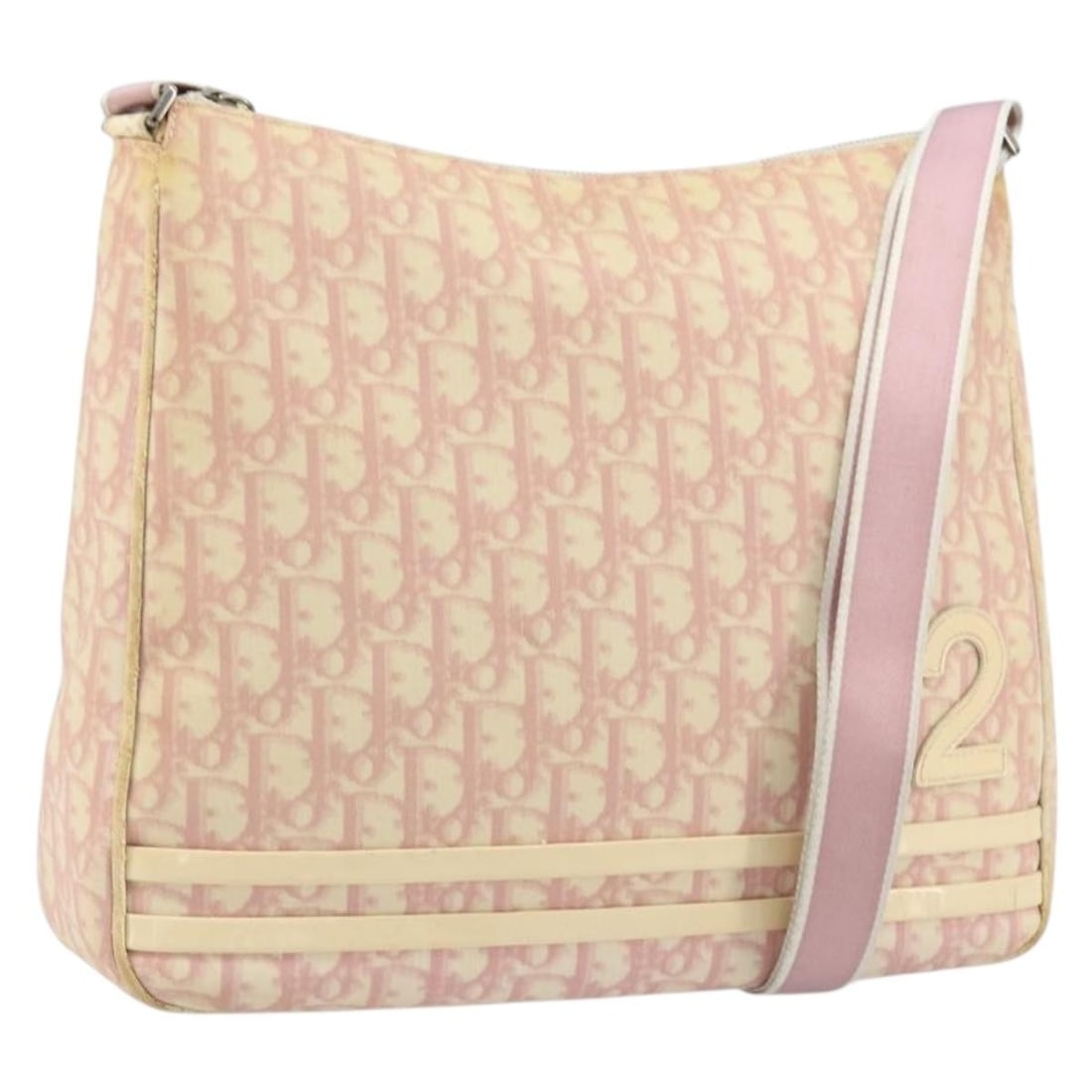 Christian Dior Pink Trotter Canvas PVC Leather Shoulder Bag Silver Details: Christian Dior Pink Trotter Canvas PVC Leather Shoulder Bag Silver Details This Christian Dior Trotter Canvas shoulder bag features a pink and silver color scheme with PVC leather and canvas materials