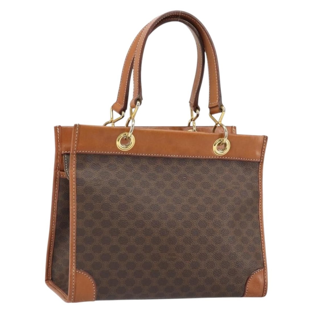 CELINE Brown Gold Macadam Canvas PVC Leather Handbag Made in Italy: CELINE Brown Gold Macadam Canvas PVC Leather Handbag Made in Italy This CELINE handbag features a brown and gold macadam canvas exterior combined with PVC leather. It is crafted in Italy and designed 