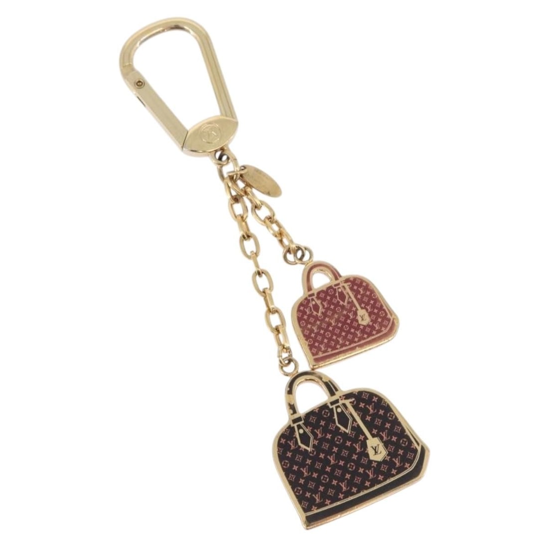Louis Vuitton Iconic LV Metal Bag Charm Red Black Italy: Louis Vuitton Iconic LV Metal Bag Charm Red Black Italy Louis Vuitton iconic bag charm in red and black metal, made in Italy. The piece measures approximately 3 cm wide with a total length of approxim