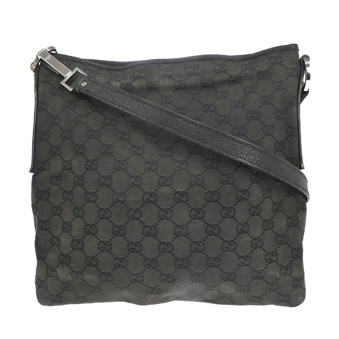 Vintage Gucci GG Medium Shoulder Bag in Black Canvas: Vintage Gucci GG Medium Shoulder Bag in Black Canvas Vintage Gucci shoulder bag in black GG canvas with leather trim and a zip closure. This medium bag features a shoulder strap, inner pocket, and bla