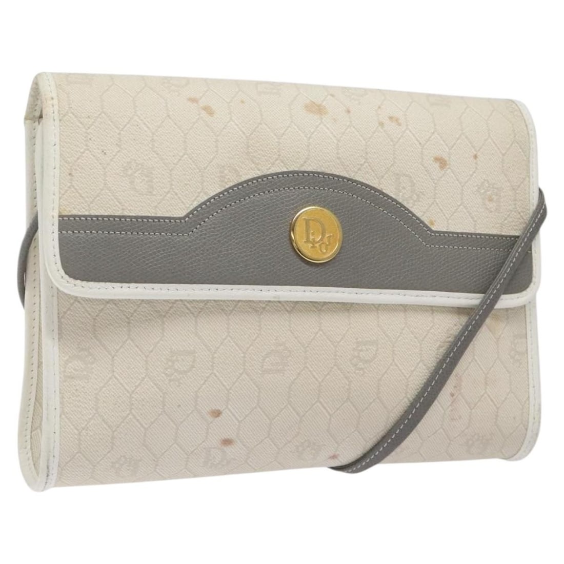 Christian Dior White Honeycomb Pattern PVC Leather Shoulder Bag: Christian Dior White Honeycomb Pattern PVC Leather Shoulder Bag This Christian Dior shoulder bag is crafted from white honeycomb canvas and PVC leather. Designed for women, it features a classic shoul