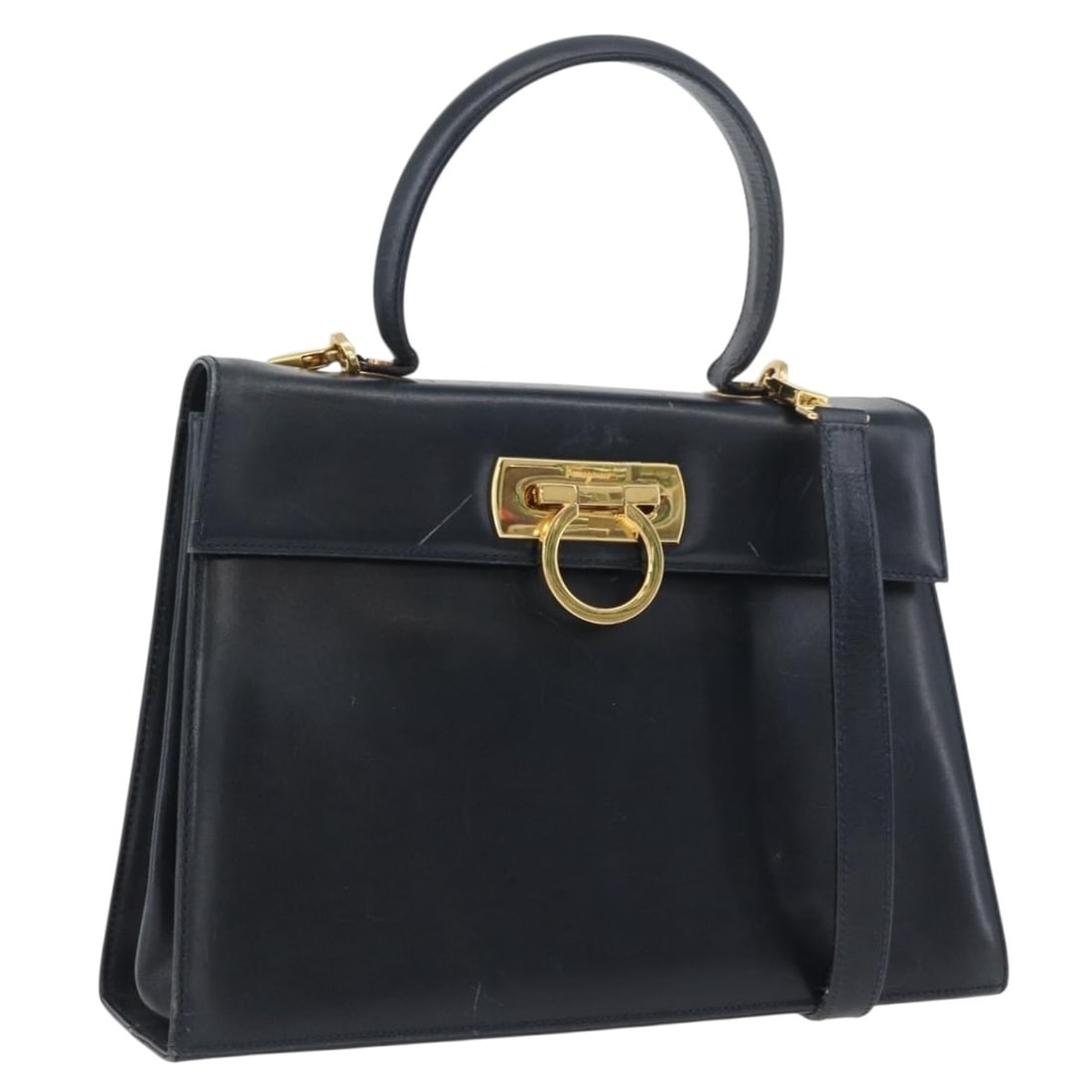 Salvatore Ferragamo Navy Leather Gancini Convertible Handbag with Shoulder Strap: Salvatore Ferragamo Navy Leather Gancini Convertible Handbag with Shoulder Strap This Salvatore Ferragamo Gancini handbag is crafted from navy leather and features a versatile 2-way design, allowing i