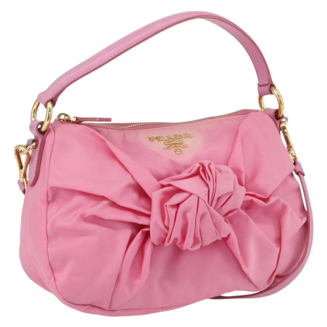 PRADA Pink Nylon Shoulder Bag Gold Tone Hardware 162345: PRADA Pink Nylon Shoulder Bag Gold Tone Hardware 162345 PRADA shoulder bag in nylon with a pink and gold exterior. Made in Italy, this women's bag measures approximately 27 cm wide, 16 cm high, and 11