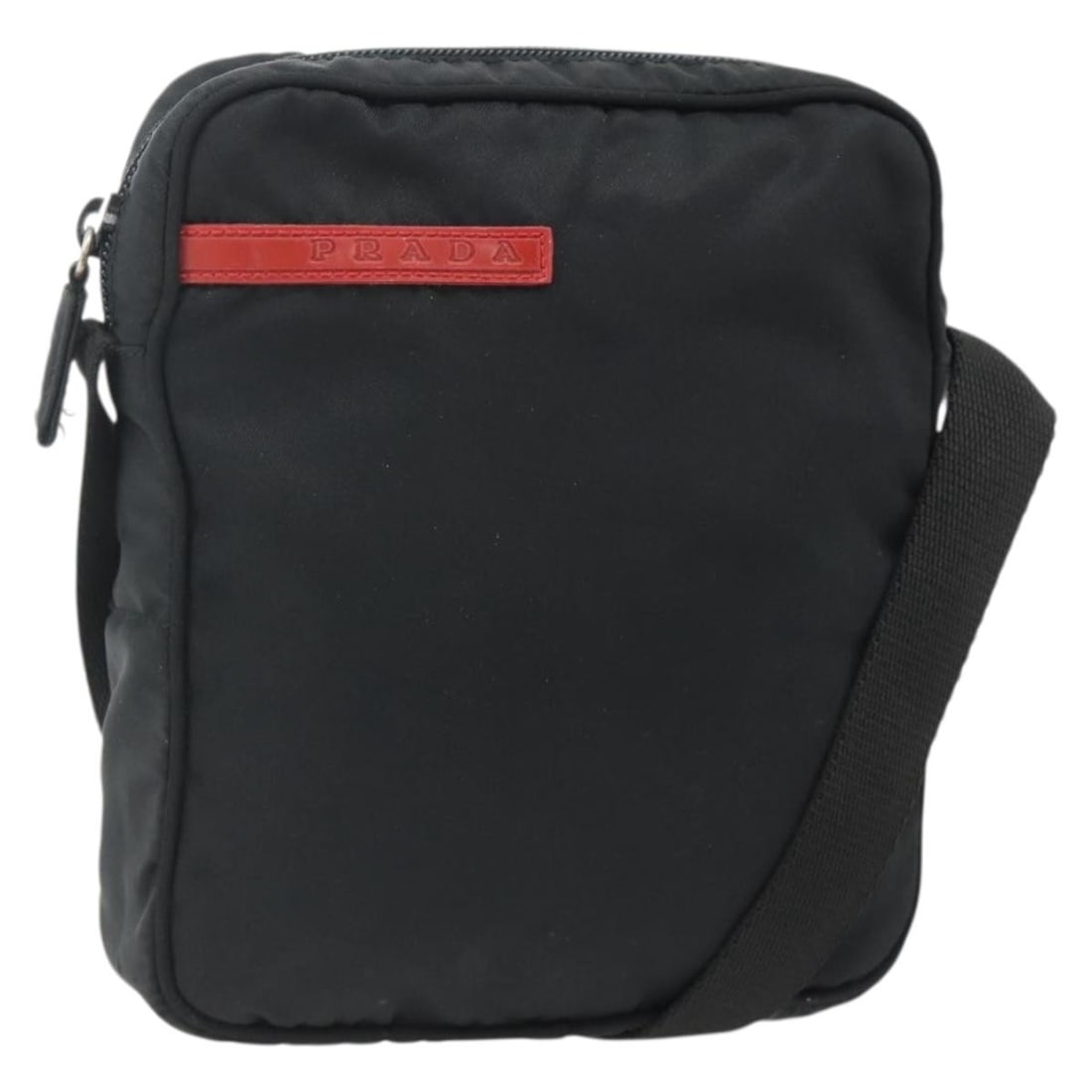 Prada Nylon Shoulder Bag Black Silver Made in Italy: Prada Nylon Shoulder Bag Black Silver Made in Italy Prada sports shoulder bag in black and silver nylon, made in Italy. This shoulder bag features a compact silhouette with a shoulder drop of approxim