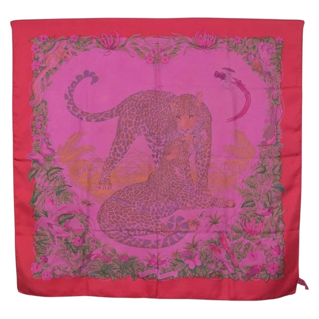 Hermes Jungle Love Silk Carre 90 Scarf in Pink: Hermes Jungle Love Silk Carre 90 Scarf in Pink Hermes Carre 90 silk scarf in the "Jungle Love" design, presented in pink. It measures approximately 90 cm x 90 cm (35.4 x 35.4 inches) and was made in F