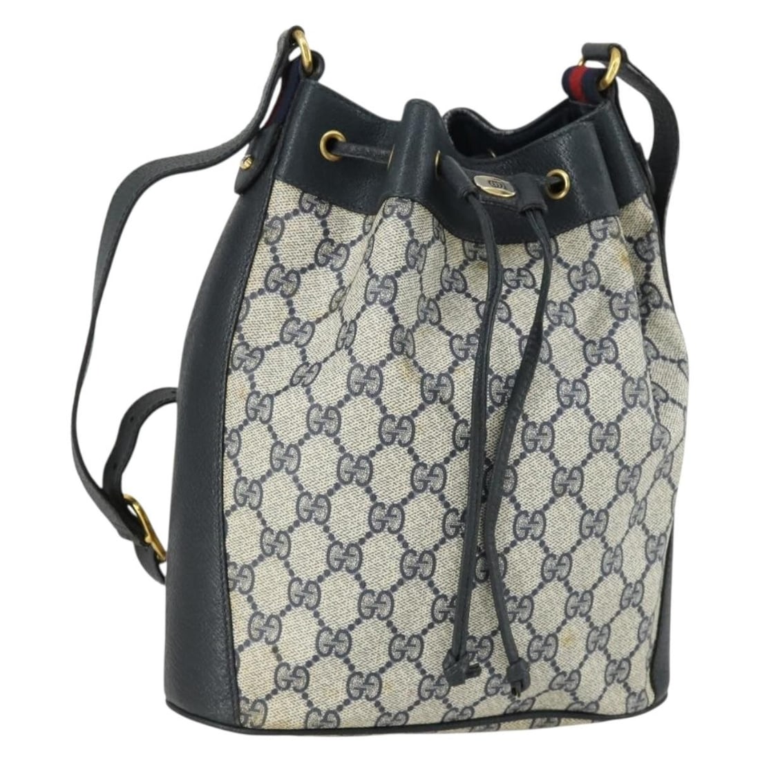 Gucci 41 02 034 GG Supreme Sherry Shoulder Bag Navy Gold PVC Leather: Gucci 41 02 034 GG Supreme Sherry Shoulder Bag Navy Gold PVC Leather A Gucci GG Supreme Sherry Line shoulder bag made in Italy, crafted from PVC leather and GG canvas in a navy and gold colorway. It f