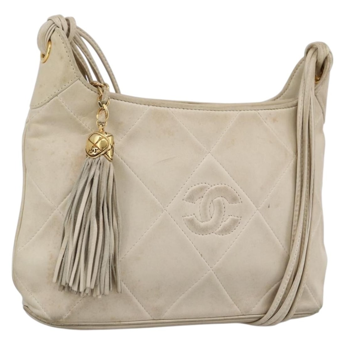 Chanel Matelasse Lambskin Shoulder Bag Ivory with Gold CC: Chanel Matelasse Lambskin Shoulder Bag Ivory with Gold CC CHANEL Matelasse shoulder bag in ivory and gold lamb skin, made in Italy. The bag measures approximately W26 x H17 x D7 cm, with a shoulder dr