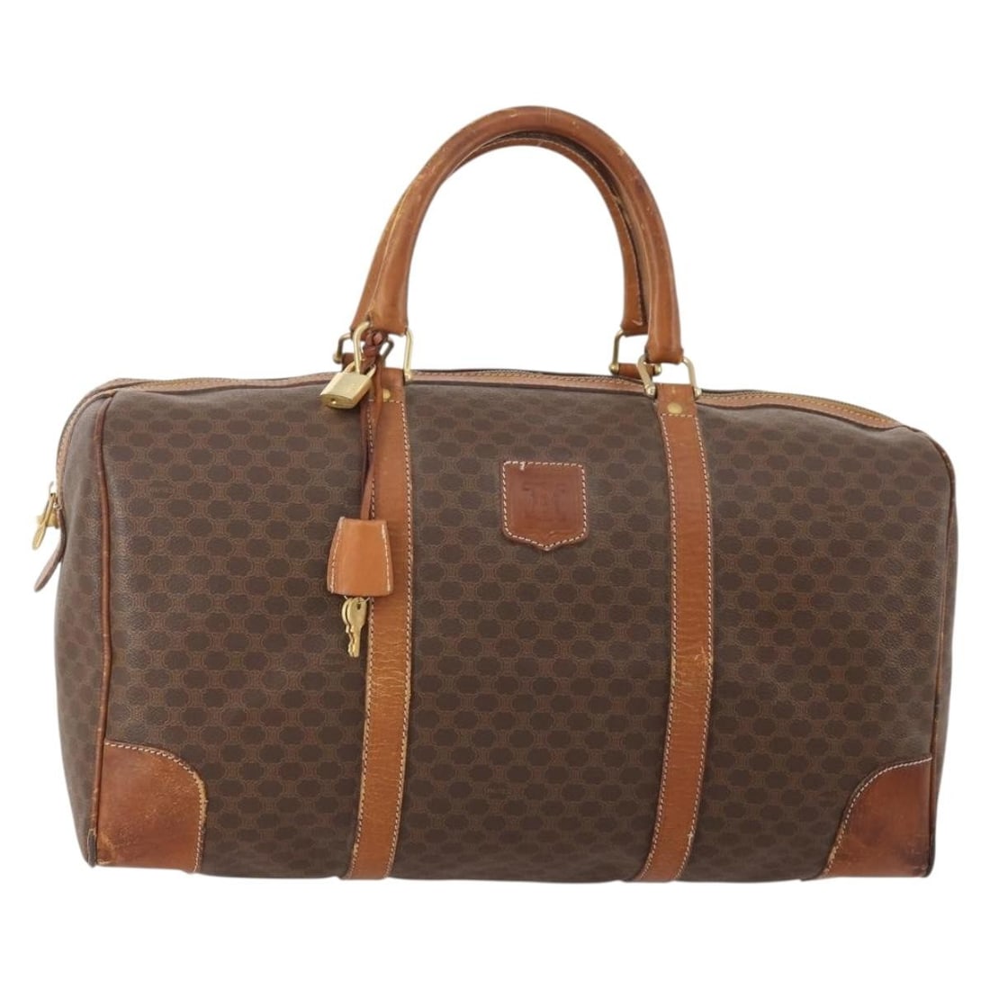 CELINE Macadam Canvas Brown Gold Boston Bag Padlock Key Clochette: CELINE Macadam Canvas Brown Gold Boston Bag Padlock Key Clochette This CELINE Boston Bag features the iconic Macadam canvas with PVC leather accents in brown and gold tones. Designed for women, it off