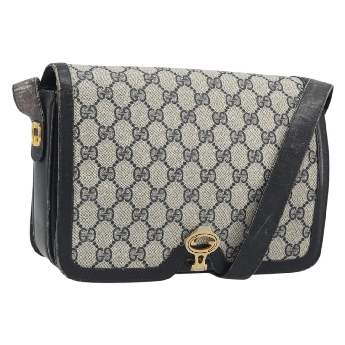 Gucci GG Supreme Navy PVC Leather Shoulder Bag Gold Tone: Gucci GG Supreme Navy PVC Leather Shoulder Bag Gold Tone A Gucci GG Supreme shoulder bag in navy and gold tone, made from PVC leather and crafted in Italy. It measures approximately W25 cm x H19 cm x 