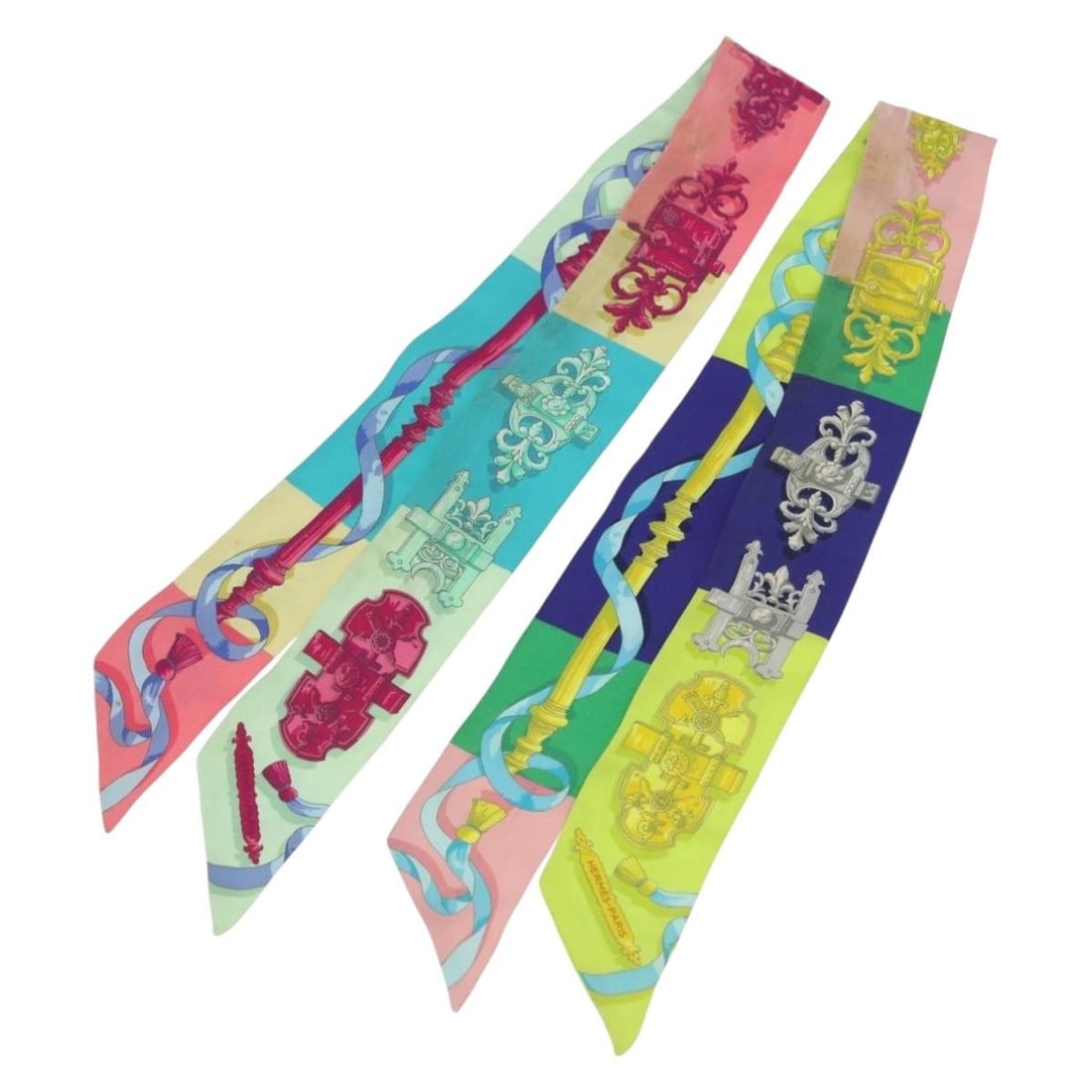 Pair of Hermes Twilly Silk Scarves Blue Red Green with Box: Pair of Hermes Twilly Silk Scarves Blue Red Green with Box Hermes Twilly scarf silk 2-set in blue, red, and green. Made in France and offered with the item box. The scarves show surface rubbing, stain