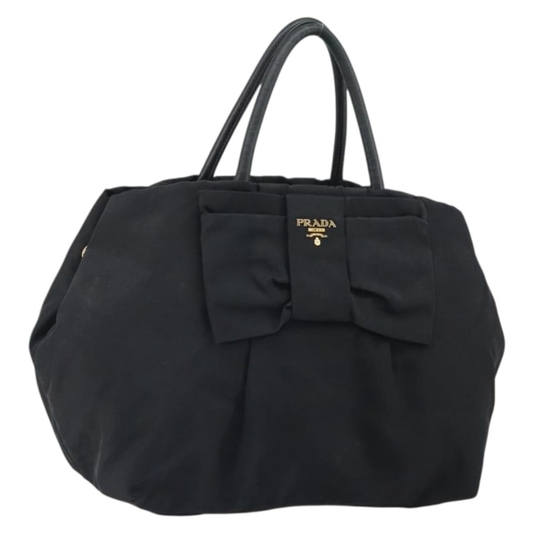 Black Nylon Prada Handbag with Gold Accents Made in Italy: Black Nylon Prada Handbag with Gold Accents Made in Italy This PRADA handbag features a black nylon exterior with gold-tone accents. Made in Italy, it offers a practical and stylish design with a hand