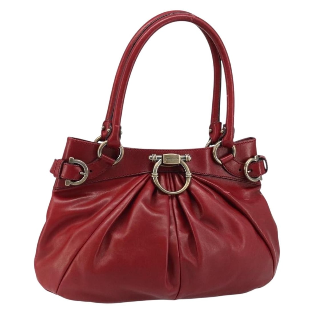 Red Leather Gancini Handbag by Salvatore Ferragamo: Red Leather Gancini Handbag by Salvatore Ferragamo This Salvatore Ferragamo Gancini handbag is crafted from red leather and features a classic, elegant design. Made in Italy, it is designed for women 