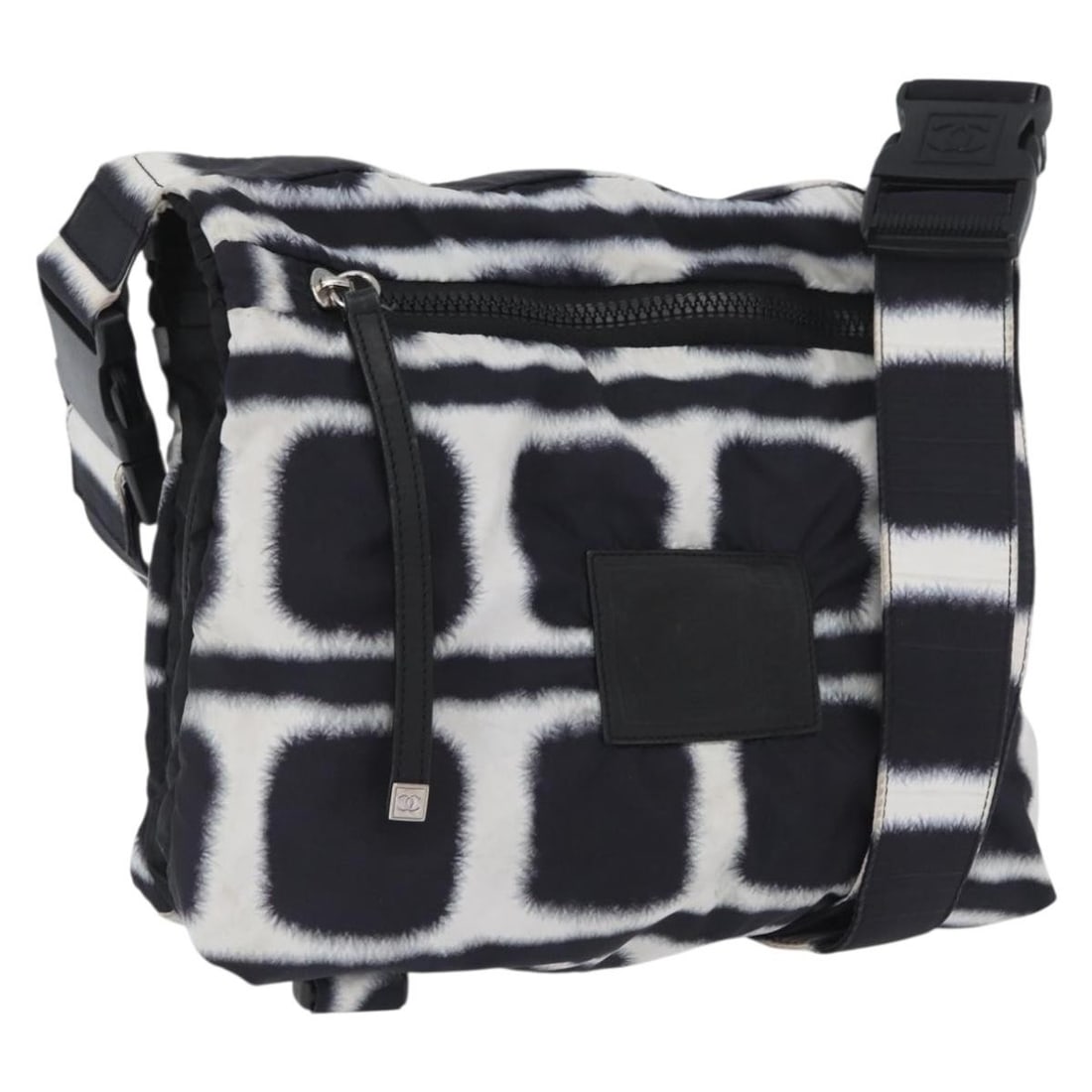 CHANEL CC Nylon Shoulder Bag Black White Silver Italy: CHANEL CC Nylon Shoulder Bag Black White Silver Italy A CHANEL shoulder bag in black, white, and silver nylon, made in Italy. It features a shoulder strap with an approximate drop of 30 to 60 cm and m