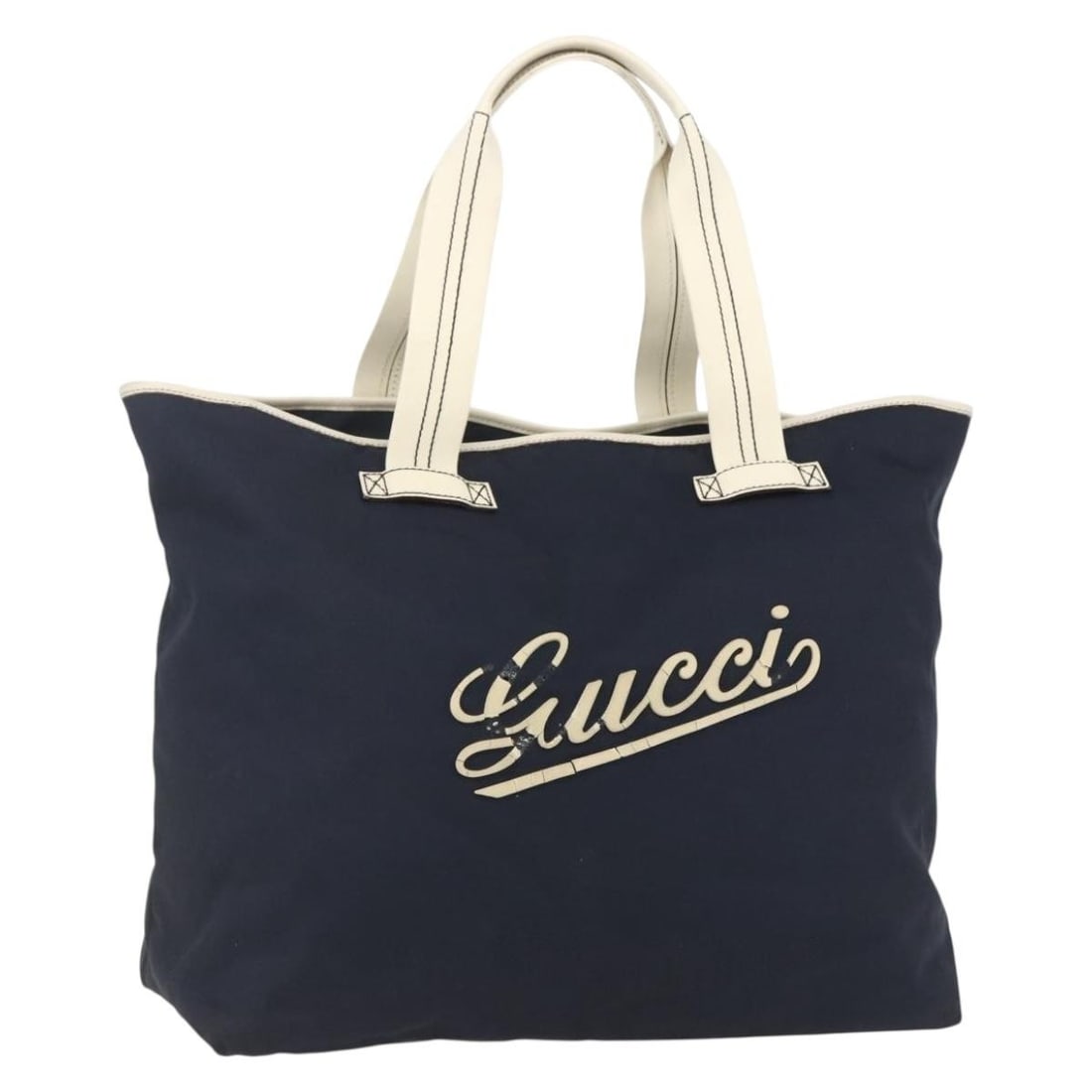 Gucci 169943 Navy Silver Nylon Women Tote Bag: Gucci 169943 Navy Silver Nylon Women Tote Bag This GUCCI tote bag is crafted from navy and silver nylon and features a spacious design, making it suitable for everyday use. The bag is made in Italy an