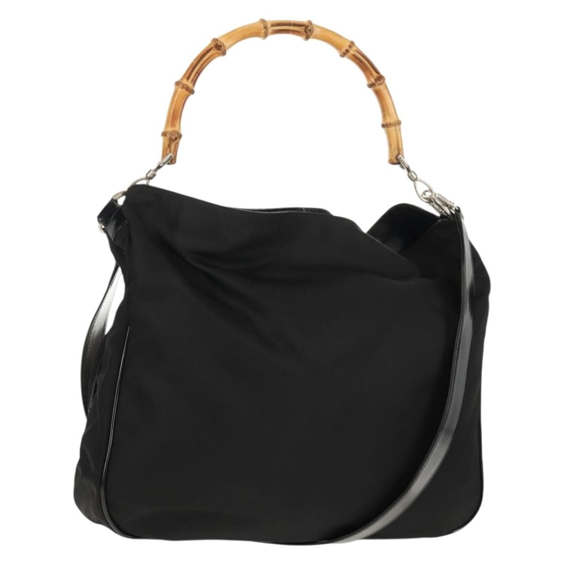 Gucci Bamboo Black Nylon 2way Handbag with Gold Hardware and Shoulder Strap: Gucci Bamboo Black Nylon 2way Handbag with Gold Hardware and Shoulder Strap This GUCCI Bamboo Hand Bag is crafted from black nylon and features gold-tone accents. Designed as a 2-way bag, it includes 