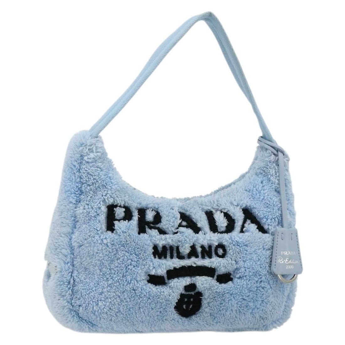 Prada Light Blue Pile Hand Bag Silver Tone Clochette: Prada Light Blue Pile Hand Bag Silver Tone Clochette This PRADA hand pouch is crafted in light blue and silver pile with a hand bag style. It includes a clochette accessory and was made in Italy. The 