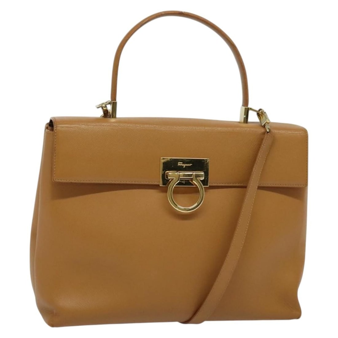 Salvatore Ferragamo Gancini beige gold leather handbag with shoulder strap: Salvatore Ferragamo Gancini beige gold leather handbag with shoulder strap This Salvatore Ferragamo Gancini handbag is crafted from leather in a beige and gold color scheme. Designed for versatile use