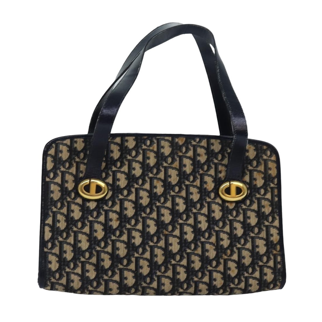 Christian Dior Navy Trotter Canvas Handbag Made in France: Christian Dior Navy Trotter Canvas Handbag Made in France Christian Dior Trotter canvas handbag in navy, made in France. This women's handbag shows heavy use, with wear throughout including an out-of-