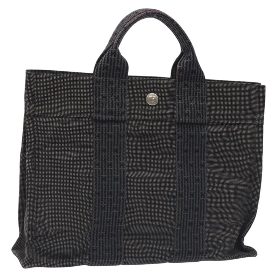 Hermes Her Line PM gray silver canvas women s backpack: Hermes Her Line PM gray silver canvas women s backpack This Hermes Her Line PM backpack features a gray and silver canvas exterior and is crafted in France. The bag is designed for women and offers a 