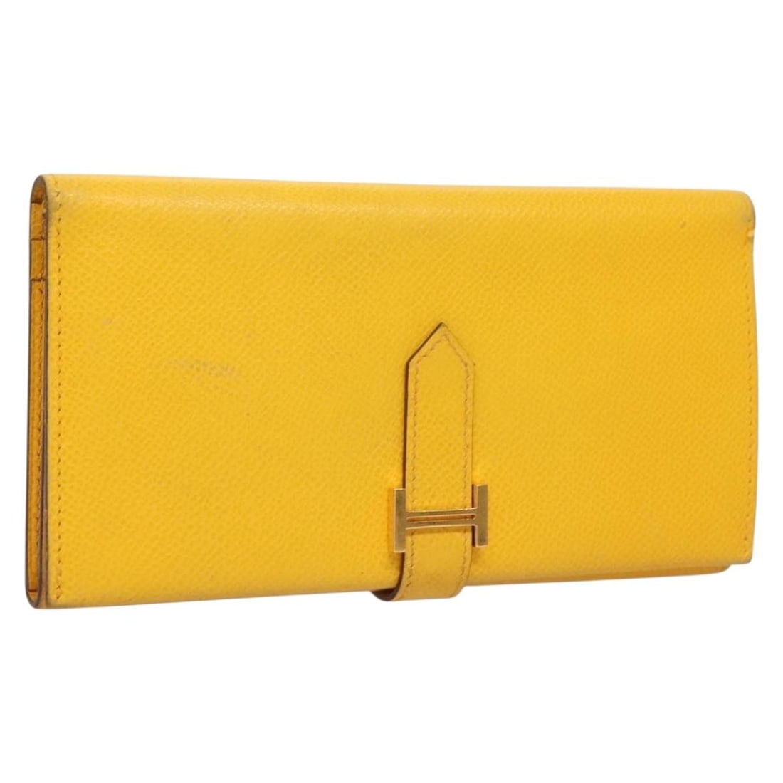 Hermes Bean Leather Wallet in Yellow Made in France: Hermes Bean Leather Wallet in Yellow Made in France Authentic Hermes Bean wallet in yellow leather, made in France. This women's wallet shows heavy use, with rubbing and stains on the exterior and int