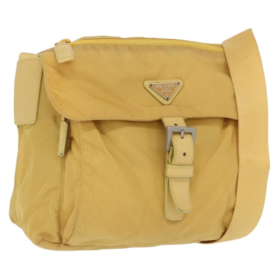 PRADA Nylon Shoulder Bag Yellow Silver Made in Italy: PRADA Nylon Shoulder Bag Yellow Silver Made in Italy Prada shoulder bag in yellow nylon with silver-tone metal fittings. Made in Italy, this pre-owned bag features a shoulder strap with an approximate