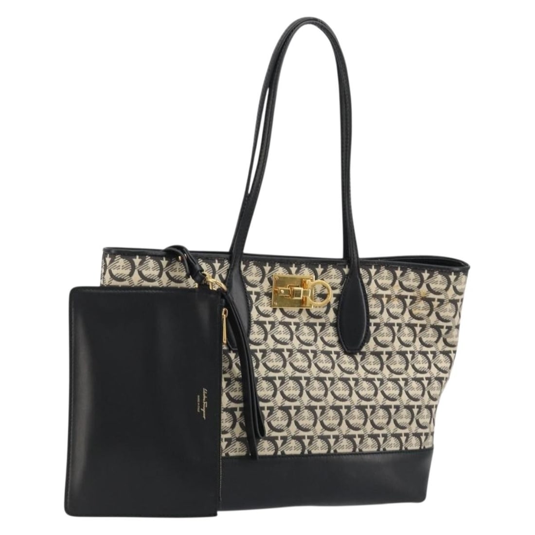 Black Canvas Tote Bag Salvatore Ferragamo Gancini with Pouch: Black Canvas Tote Bag Salvatore Ferragamo Gancini with Pouch Salvatore Ferragamo Gancini tote bag in black and gold canvas, made in Italy. It comes with a pouch and features a tote bag style with a se