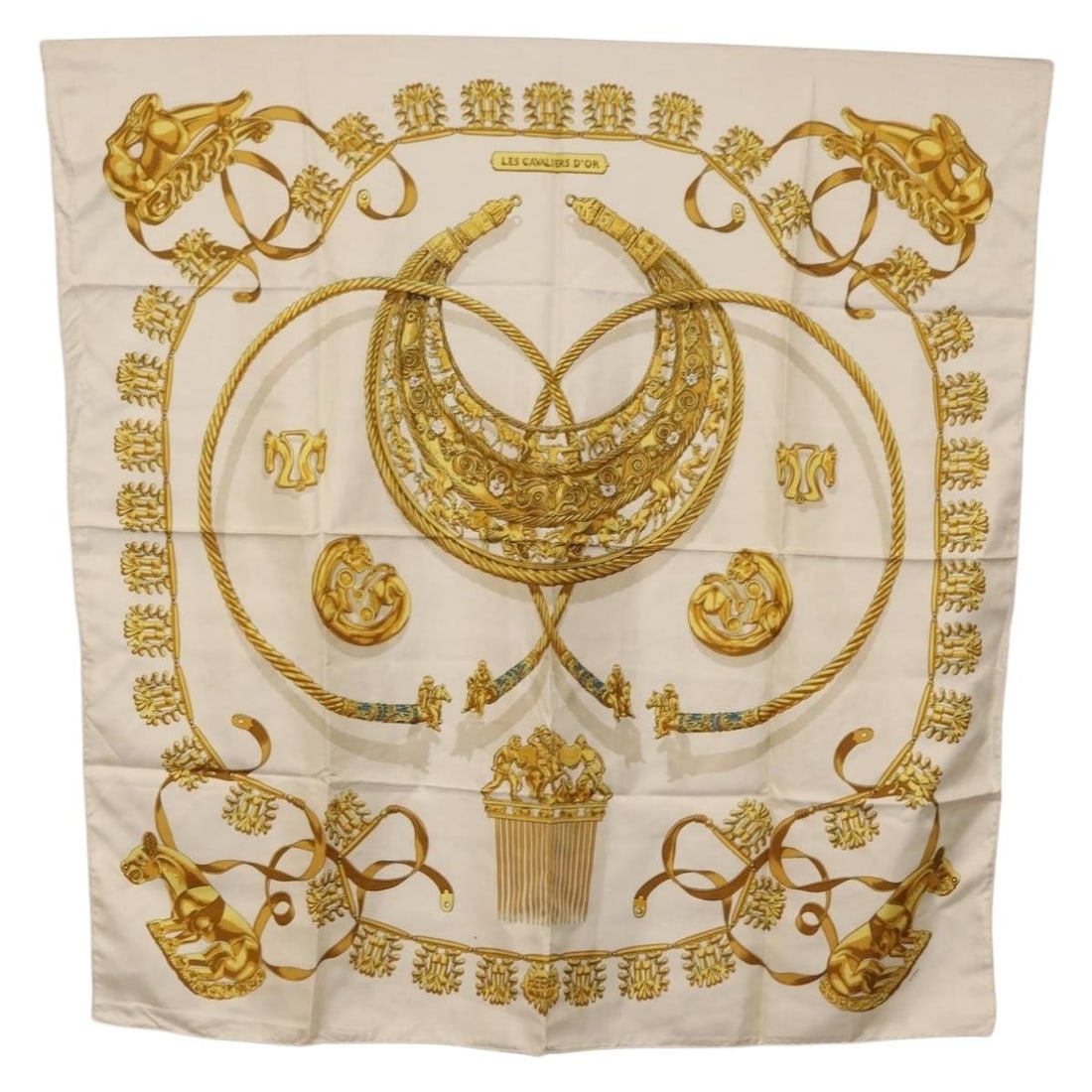 Hermes Les Cavaliers D'Or Silk Carre 90 Scarf White: Hermes Les Cavaliers D'Or Silk Carre 90 Scarf White Hermes Carre 90 silk scarf in white, titled "Les Cavaliers d'Or." It is a 90 cm square scarf made in France. Condition is heavily used, with surface