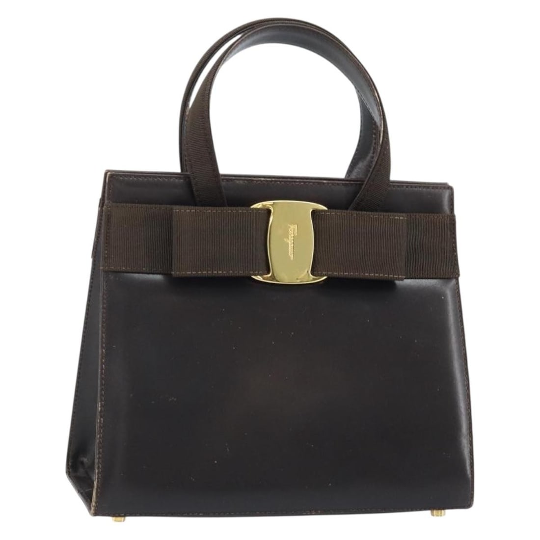 Salvatore Ferragamo Vala Brown Leather Handbag Gold Accents Italy: Salvatore Ferragamo Vala Brown Leather Handbag Gold Accents Italy This Salvatore Ferragamo Vala handbag is crafted from brown leather with gold-tone accents. Designed for women, it features a structur