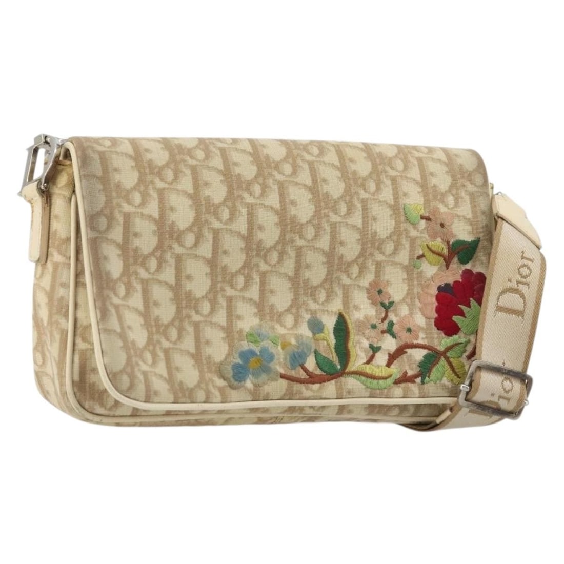 Christian Dior Trotter shoulder bag beige canvas PVC leather silver tone: Christian Dior Trotter shoulder bag beige canvas PVC leather silver tone Christian Dior Trotter Canvas Shoulder Bag in beige and silver, made in Italy. This shoulder bag is crafted from PVC leather an