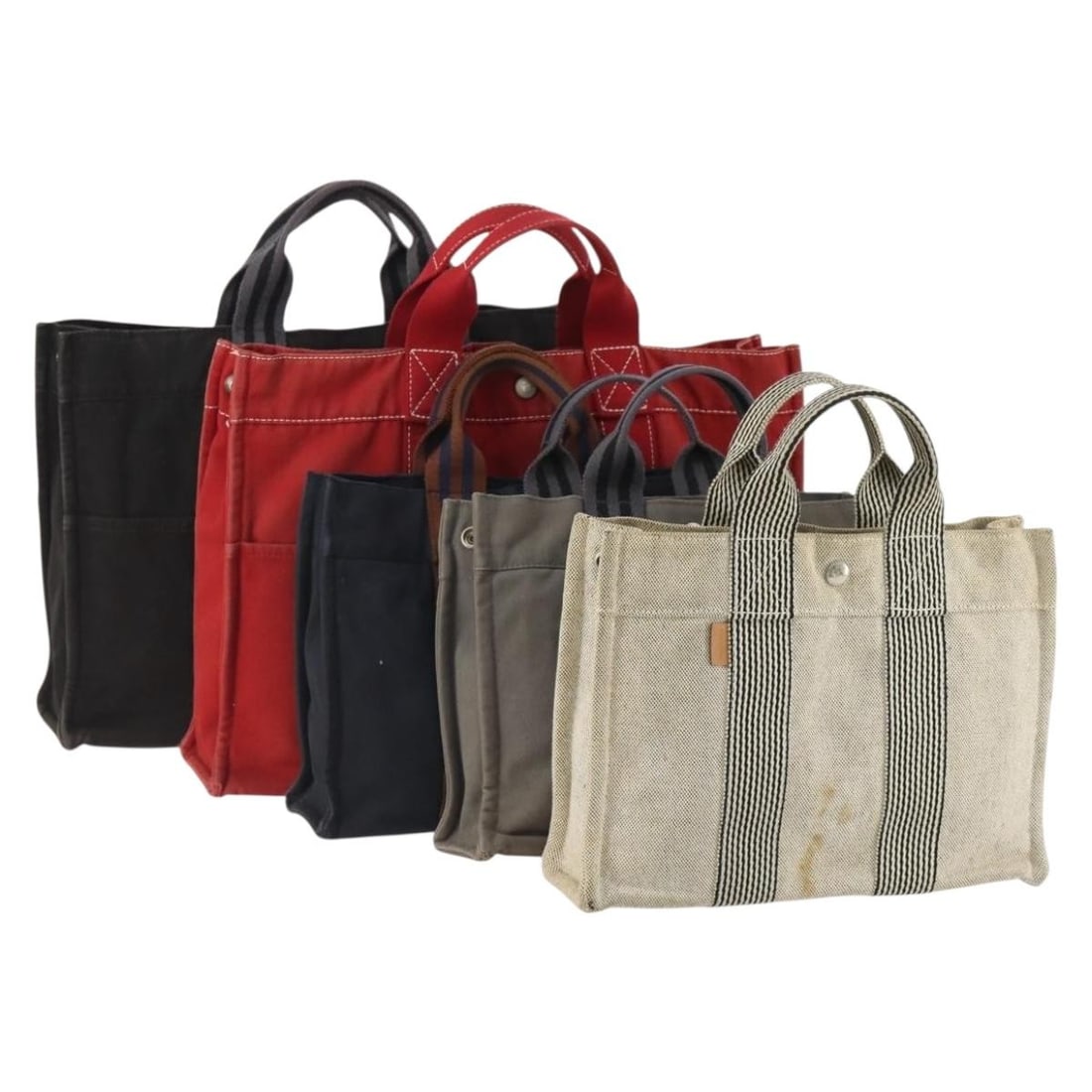 Set of 5 Hermes Canvas Tote Bags in Red Gray and Navy: Set of 5 Hermes Canvas Tote Bags in Red Gray and Navy This is a set of five Hermes tote bags crafted from cotton in red, gray, and navy colors. Designed for women, these tote bags are made in France a