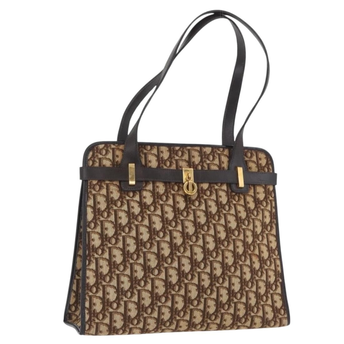 Christian Dior Beige Gold Trotter Canvas Tote: Christian Dior Beige Gold Trotter Canvas Tote Christian Dior tote bag in Trotter Canvas with a beige and gold color scheme. Made in France, this women's bag features a structured tote style with an ap