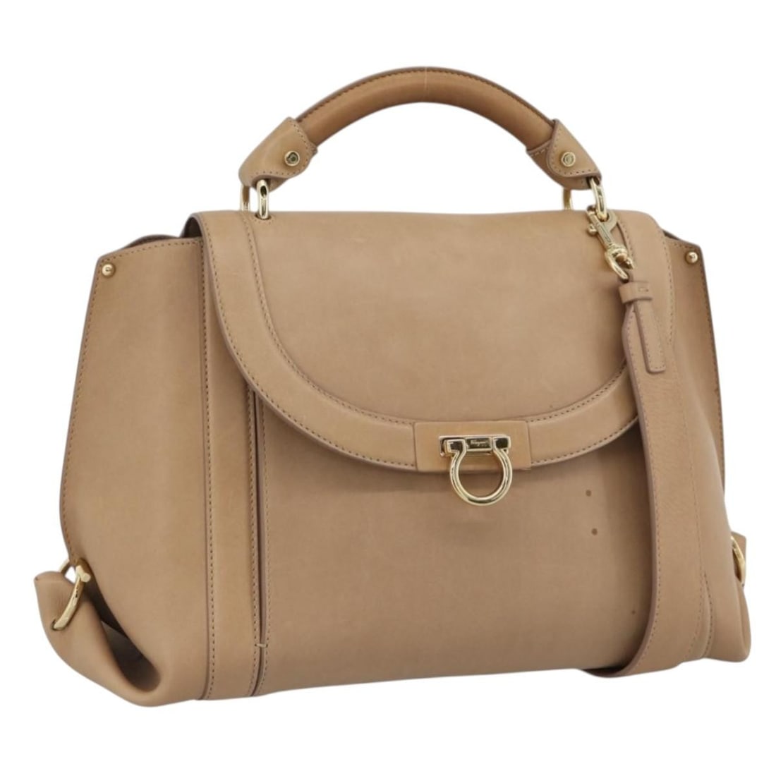 Salvatore Ferragamo Gancini 2way Leather Handbag Beige Gold Tone: Salvatore Ferragamo Gancini 2way Leather Handbag Beige Gold Tone A Salvatore Ferragamo Gancini leather handbag in beige and gold, designed as a 2-way style and accompanied by a shoulder strap. Made in